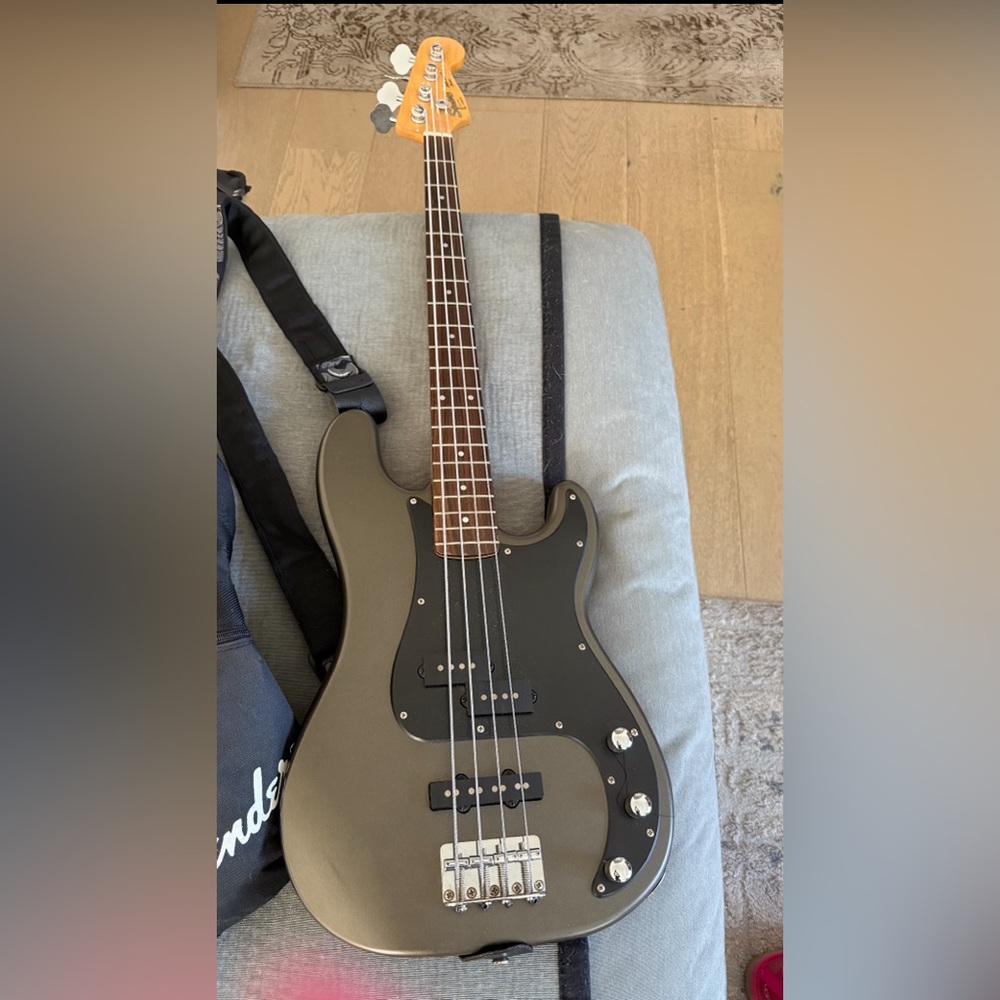 Electric Bass Guitar in Black and Brown